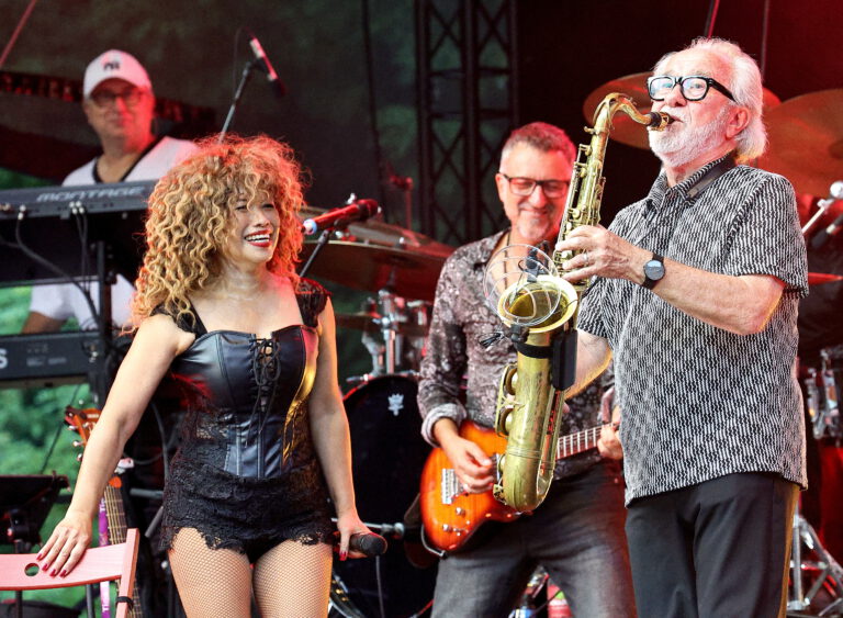 a group of people playing instruments